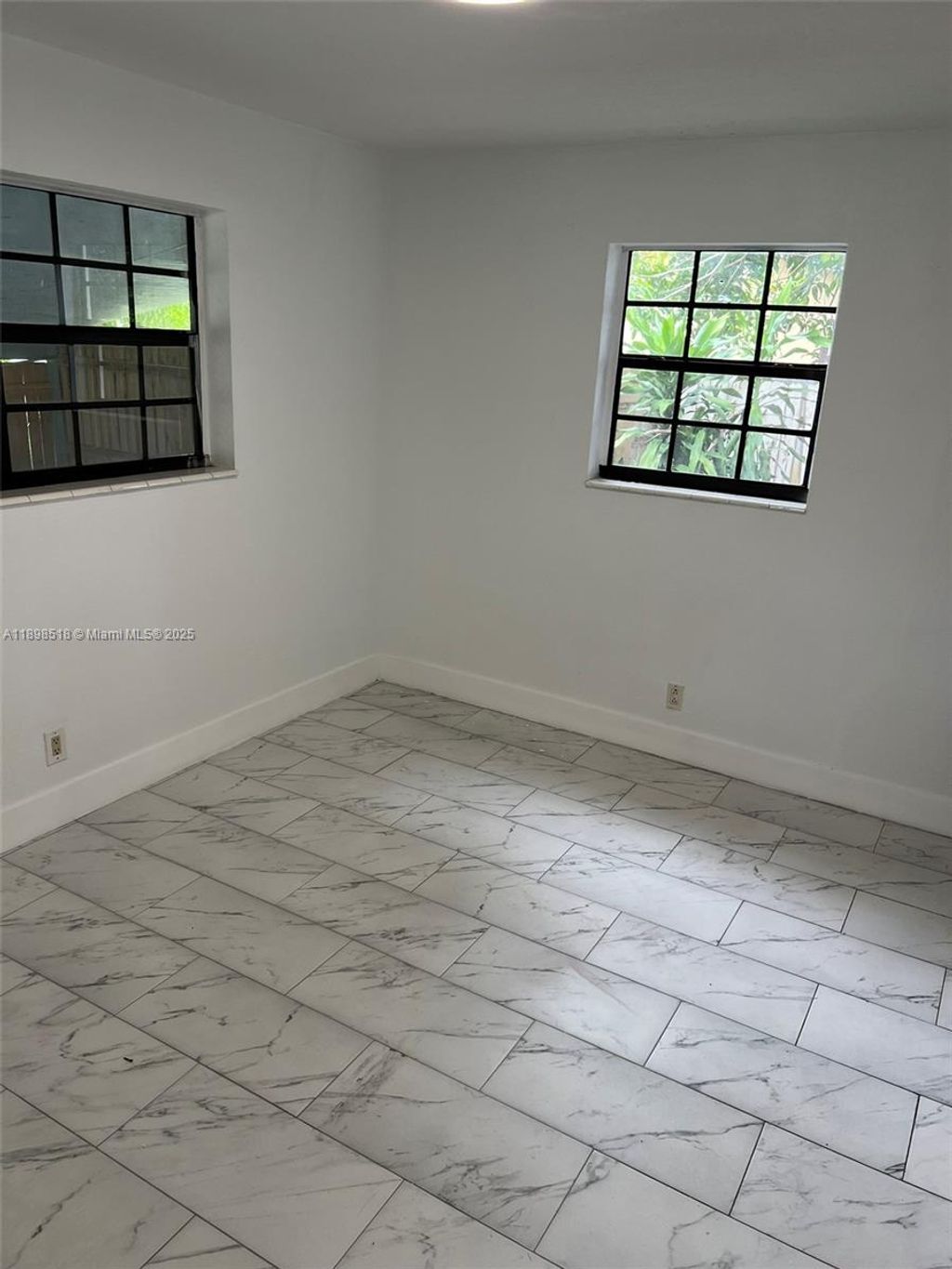 Photo of 4421 NW 33rd St #0, Lauderdale Lakes, FL 33319 (MLS # A11898518)