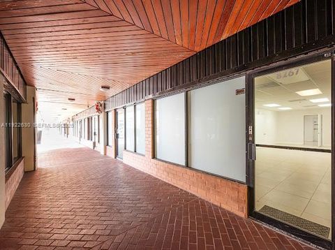 Photo of 8257 SW 124th St #8257-8259, Pinecrest, FL 33156 (MLS # A11922630)