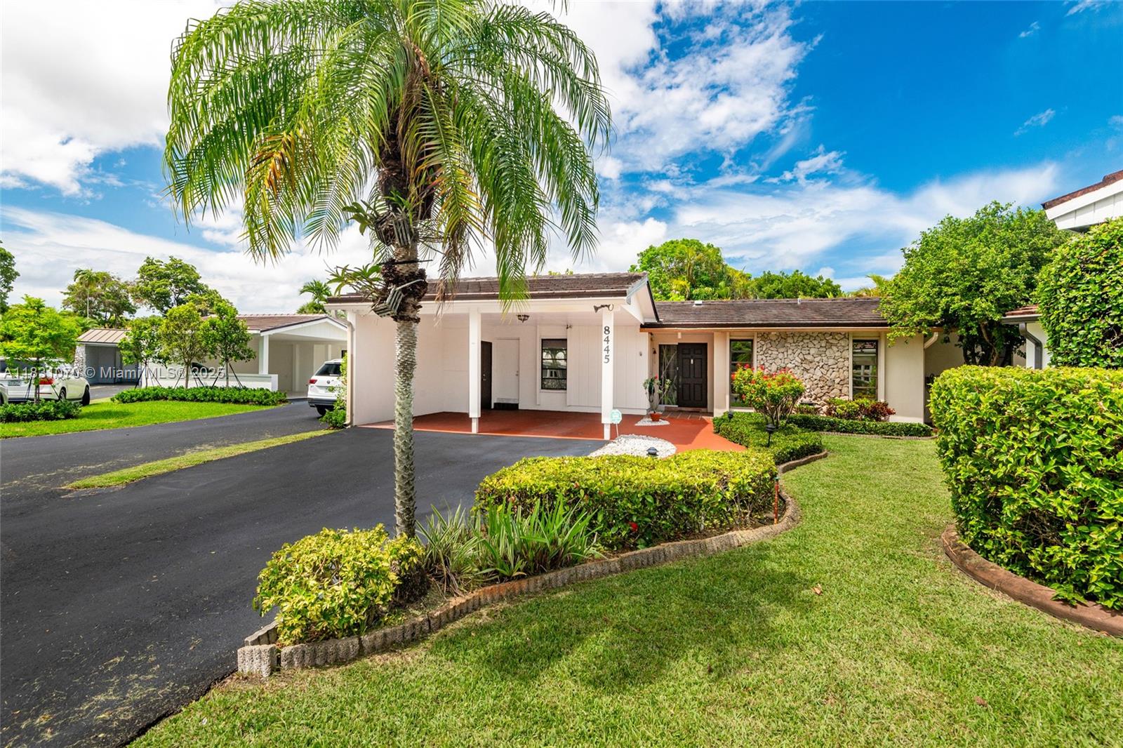Welcome to Kings Creek, one of Miami's most sought-after communities! This rare one-story 3-bedroom, 2-bath home with a fire place has been thoughtfully converted into a spacious 2-bedroom, 2-bath layout, expanding the master suite to include a large walk-in closet and a versatile extra room, perfect for a home office or recreation space. The only home in the community to feature an additional family room, enclosed porch, and side multi purpose room, offering unmatched flexibility and comfort.
Enjoy the convenience of a 2-car carport, extended driveway, and an exterior storage closet with a generator hookup. Located in a prime, central location, this home offers elegance, comfort, and a welcoming, private atmosphere. Don’t miss this unique opportunity!