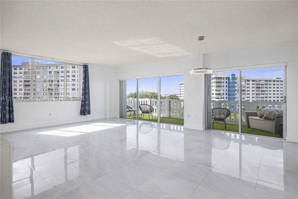 Photo of 4001 Hillcrest Dr #601, Hollywood, FL 33021 (MLS # A11790385)