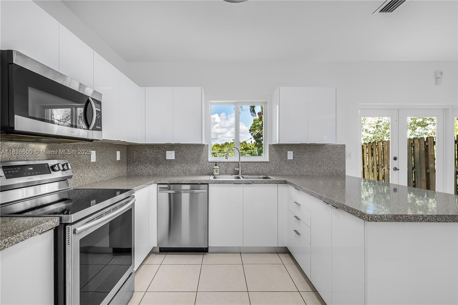 Discover the beauty of this exquisite 3-bedroom, 2 and 1/2 bathroom townhouse nestled within beautiful Emerald Lakes gated community. Step inside to find a newly installed floor on the second level, impact windows, upgraded bathrooms and kitchen, new appliances: dishwasher and refrigerator. The community offers amenities such as pool, basketball court, and a playground for the little ones. The townhouse has one covered garage parking plus 3 parking spaces outside of the property. Situated in an ideal location, the gem is conveniently close to supermarkets, shopping centers, schools, and the Tamiami Station for easy access to the public transportation. Experience the best living in the Emerald Lakes community!