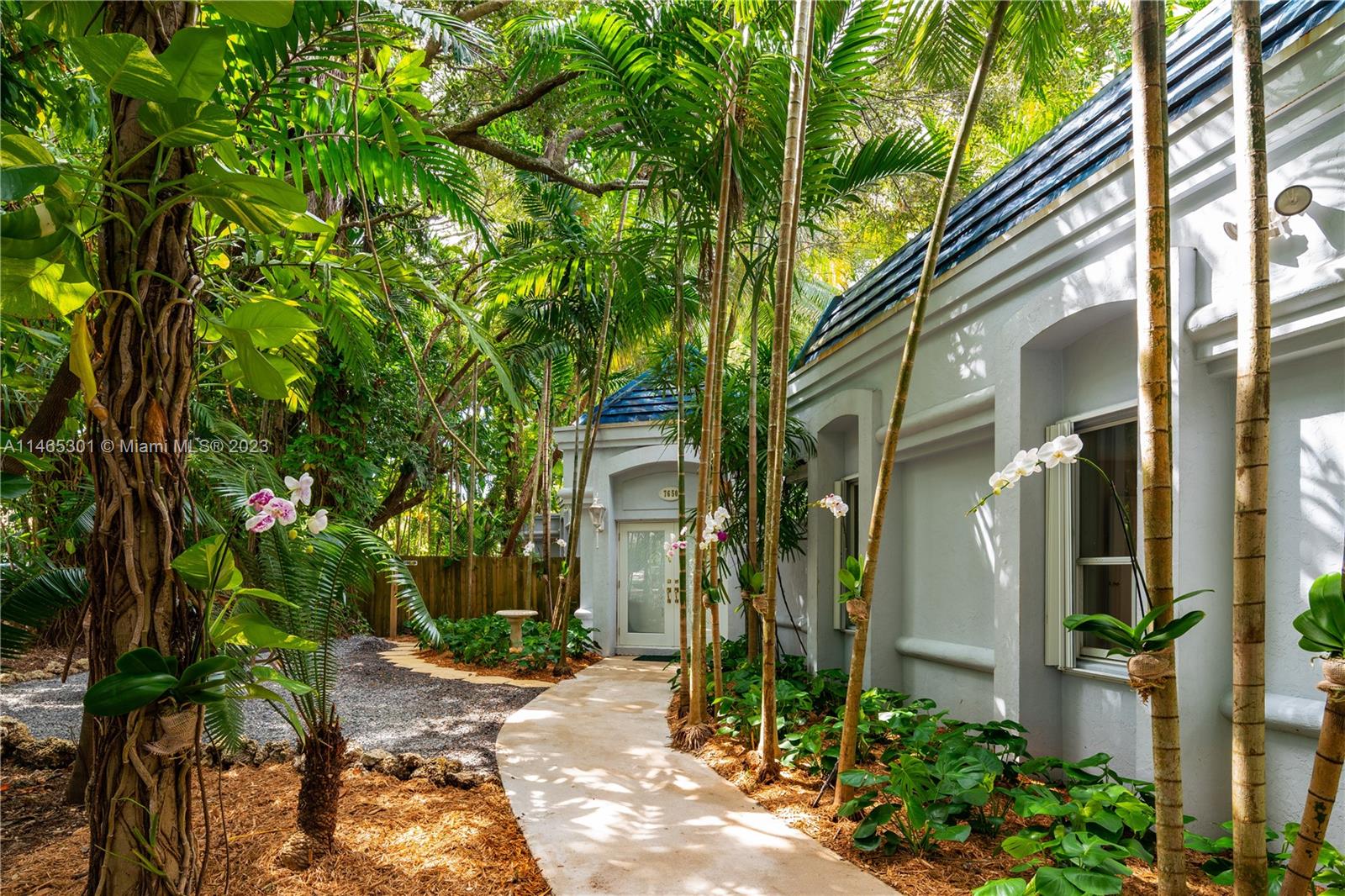This one-story French Revival estate is truly a gem, located on a quiet road between the prestigious neighborhoods of High Pines & Ponce Davis. The versatile design of the home has a center courtyard that allows for abundant natural light. The split floorplan is ingeniously designed, with all rooms surrounding generously sized living spaces. The kitchen/family room area is perfect for hosting large gatherings or enjoying a casual BBQ on the adjoining patio. The layout seamlessly blends indoor/outdoor living, creating a wonderful flow for entertaining. The primary suite is a true retreat, featuring its own anteroom that can serve as an office or cozy sitting room. As you step onto the grounds, you'll be greeted by the majestic presence of banyan trees, oaks, and palms. A Very Special Home.