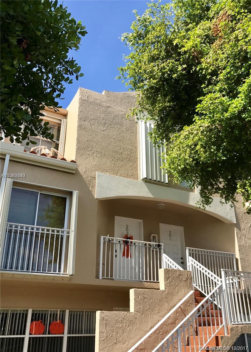 This is true gem!!! Tastefully updated 2 story townhouse in gated community with 24 hour security, pool & playground. Property features: updated kitchen cabinets with granite tops and back splash, unique moldings and upgraded doors throughout the home, spacious closets with organizers, private master bedroom balcony, full size washer & dryer inside the unit and much more. conveniently located near 836, 826, Turnpike and minutes away from MIA Airport. Bring your pickiest buyer, this one won't last!!!