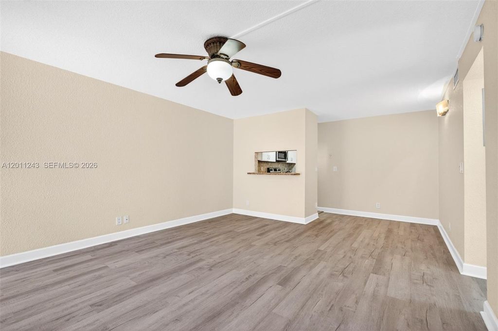 Photo of 1028 Twin Lakes Dr #21-C, Coral Springs, FL 33071 (MLS # A12011243)