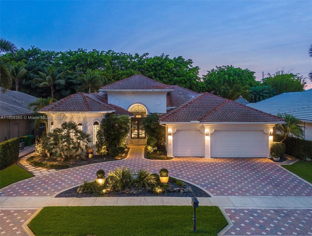 Photo of 11042 Blue Palm St, Plantation, FL 33324 (MLS # A11559365)