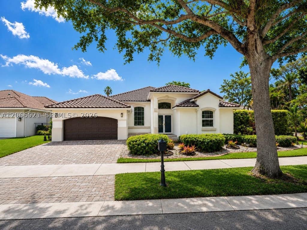 Photo of 2616 Oakbrook Ct, Weston, FL 33332 (MLS # A12066521)
