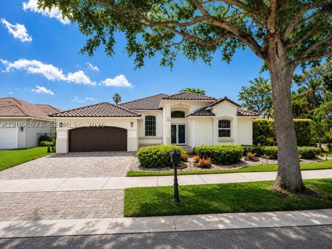 Photo of 2616 Oakbrook Ct, Weston, FL 33332 (MLS # A12066521)
