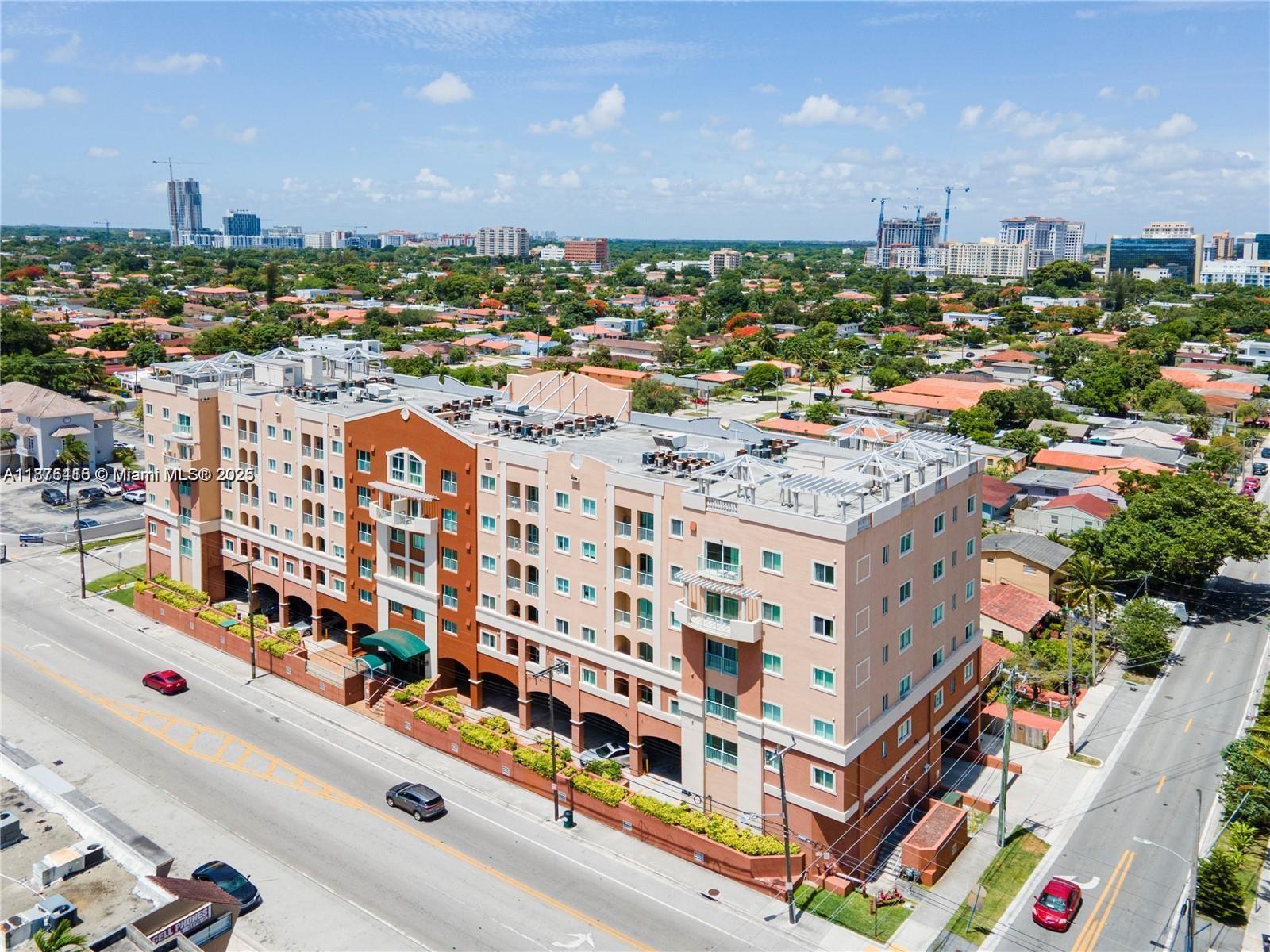 Light and bright. Beautiful view of Coral Gables from your balcony. This is a very low price for the area. 2 bedroom, 2 bath condo in an elegant building with a nice split plan layout. Washer/dryer inside. The condominium is well kept with lobby, intercom entry. Nestled between Miracle Mile, Coconut Grove, Miami Airport, and Brickell. One parking space included.