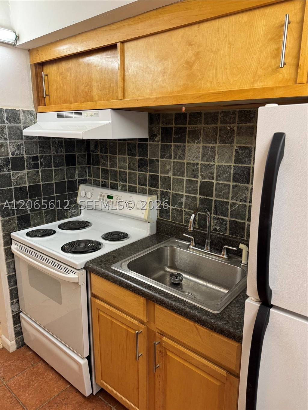 Photo of 10762 La Placida Dr #7-105, Coral Springs, FL 33065 (MLS # A12065612)