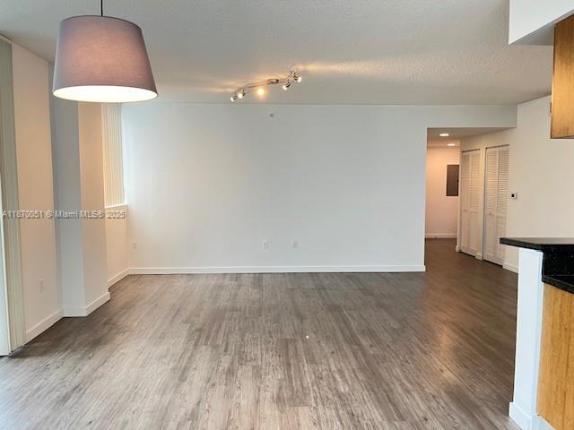 Stunning 3BR/2BA Corner Open Space Unit in the heart of Edgewater featuring a wraparound terrace with Bay and city views. This bright and spacious apartment offers a desirable split floor-plan with stylish gray laminate wood floors throughout. The open-concept kitchen boasts granite countertops and stainless steel appliances, plus washer and dryer inside unit. The primary and second bedrooms offer walk-in closets, while the third includes a wall-to-wall closet. A linen closet provides extra storage. Located in a modern high-rise with resort-style amenities: Elegant lobby, Pool, fully equipped gym, 24/7 security, and 2 assigned covered parking spaces. Prime Edgewater location, minutes from Brickell, Midtown, Wynwood, Design District, and Downtown. AVAILABLE NOW - EASY TO SHOW.