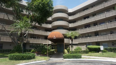 Photo of 1100 Colony Point Cir #206, Pembroke Pines, FL 33026 (MLS # A12055456)