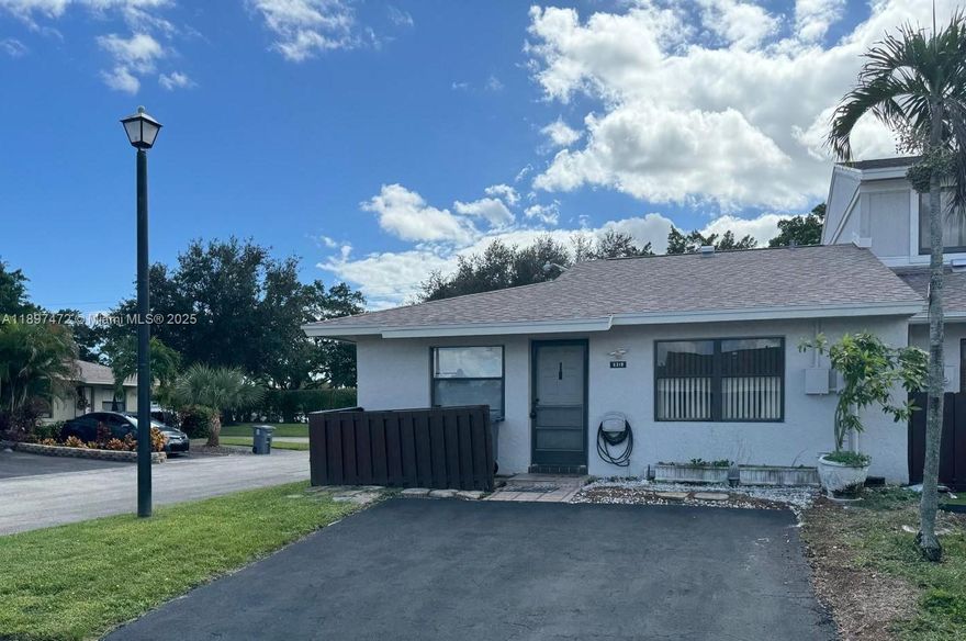 Country Lake is a hidden gem in the heart of Delray Beach. Charming 2/2 one-story corner villa just steps from the lake. Enjoy a screened, covered oversized patio, full-size washer/dryer, tile and laminate floors, and new A/C and water heater. Two parking spaces directly in front. Gated community with large pool, tennis, playground with swings, basketball and racquetball courts, plus a walking/jogging trail around the tranquil lake. Basic cable included.  One dog up to 20 lbs and cats are welcome with a fee. New roof and exterior paint. Minutes to Famous Atlantic Avenue, serene beaches, shops, dining, and major roads. Association approval ~30 days; tenant pays application; extensive background check required. Motorcycles are not permitted. No smoking please. Prefer long term tenants.