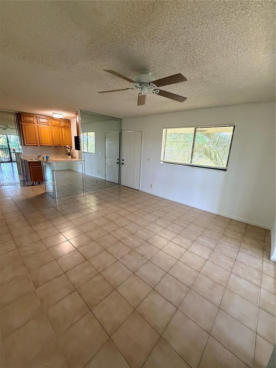 Beautiful 2-bedroom, 2-bath condo in desirable Tivoli Trace featuring a bright open layout, split bedrooms for added privacy, and a freshly painted white interior. Enjoy spacious bedrooms, in-unit washer and dryer, and a private screened patio. Assigned parking is conveniently located directly in front of the unit. Community amenities include a pool, hot tub, clubhouse, picnic area, and more. Ideally located near I-95, shopping, dining, and the beach.