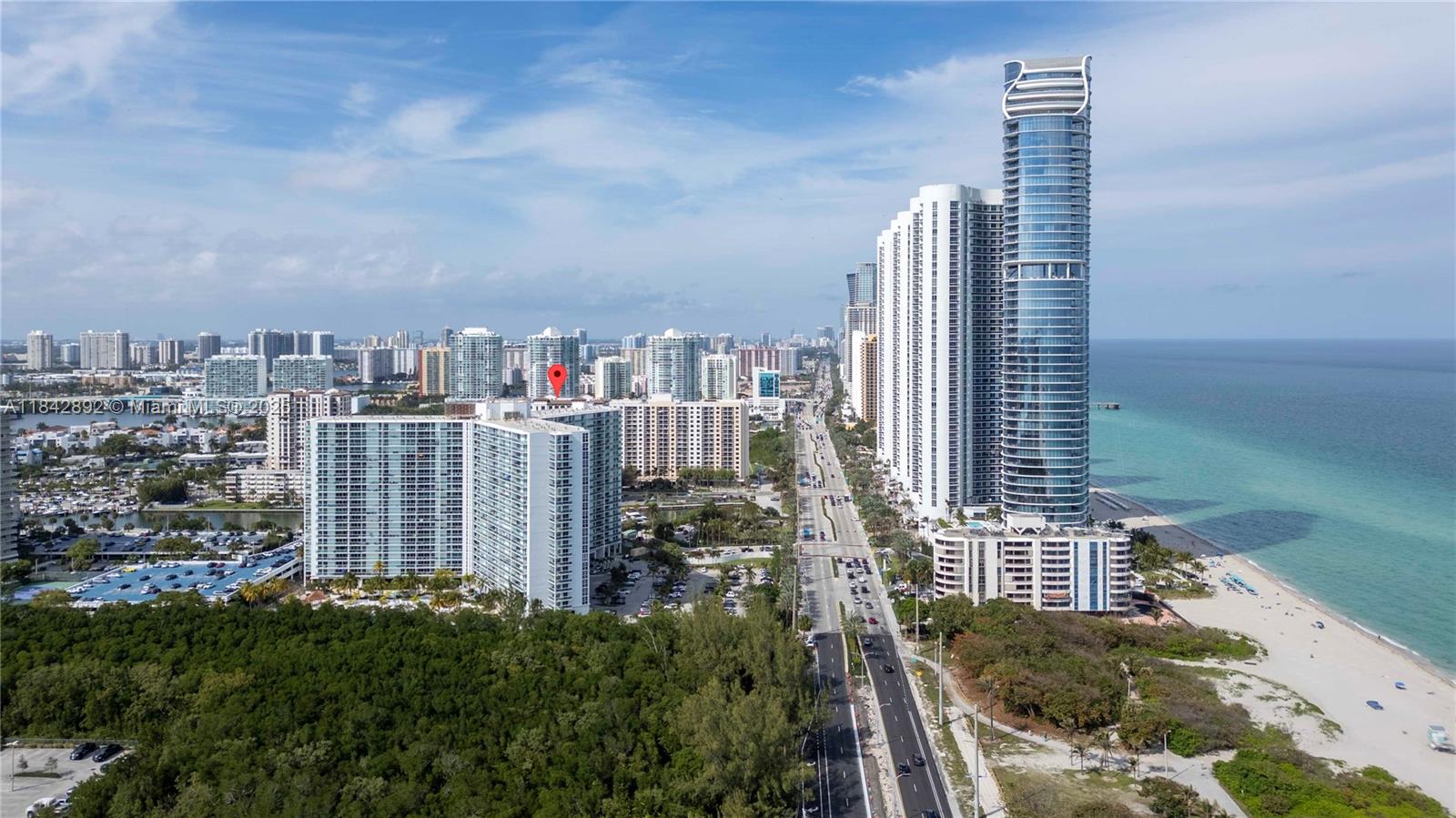 Stunningly renovated 2 bedroom featuring a contemporary open concept design with high-end appliances. Abundant closet space and elegant porcelain floors. Enjoy the proximity to the beach, Hallower Park, Bal Harbor Shopping, Aventura Mall, and Miami Beach. The lobby has been tastefully renovated, offering a modern welcome. Partial ocean views. Resort-style amenities such as tennis courts, a heated pool, jacuzzi, sauna, on-site cafe/restaurant, well-equipped gym, and convenient valet service. Experience the luxury living in this coastal gem. Basic cable and Internet included on the HOA. Unit comes with a storage on the same floor. Registered second car can be parked on the 3rd floor at no charge.