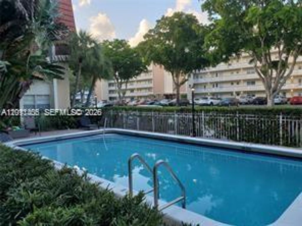 Photo of 1300 Moffett St #107, Hallandale Beach, FL 33009 (MLS # A12011406)