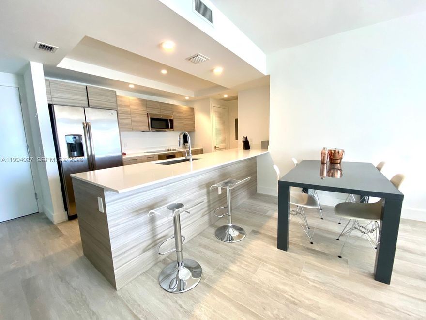 Beautiful 3-bedroom, 2-bath unit available for short-term rental at Hyde Midtown Miami. Fully furnished and move-in ready—just bring your toothbrush. Features a modern kitchen with stainless steel appliances, cookware, and utensils, plus spacious living and dining areas, in-unit washer and dryer, and comfortable, well-appointed bedrooms. Enjoy luxury amenities in a prime location near shops, dining, and entertainment.