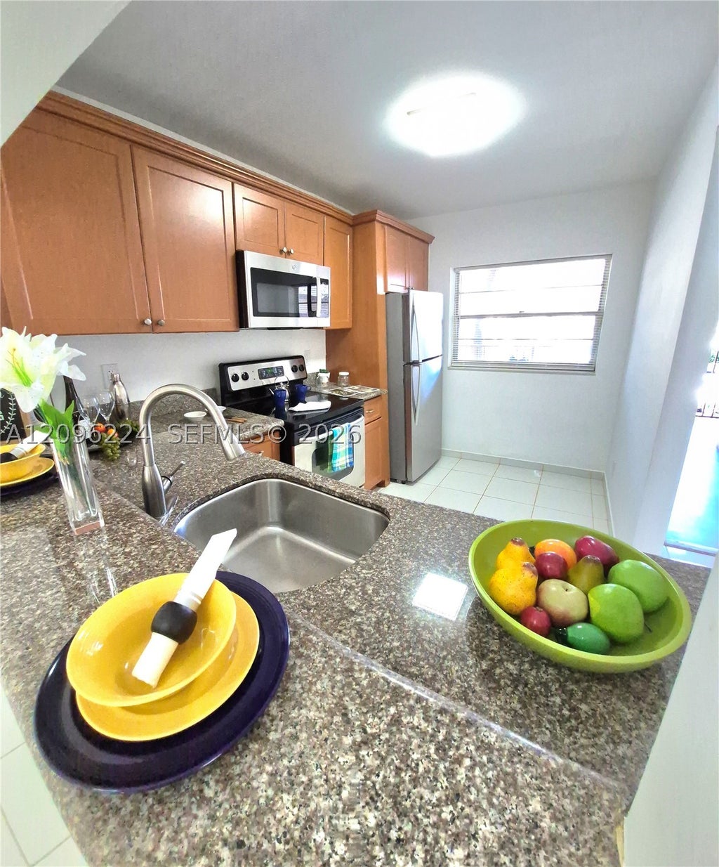 Photo of 1931 Sabal Palm Dr #203, Davie, FL 33324 (MLS # A12096224)