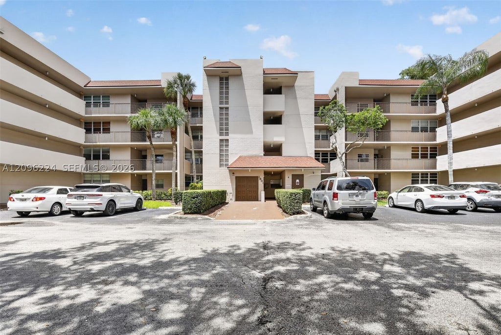 Photo of 1931 Sabal Palm Dr #203, Davie, FL 33324 (MLS # A12096224)