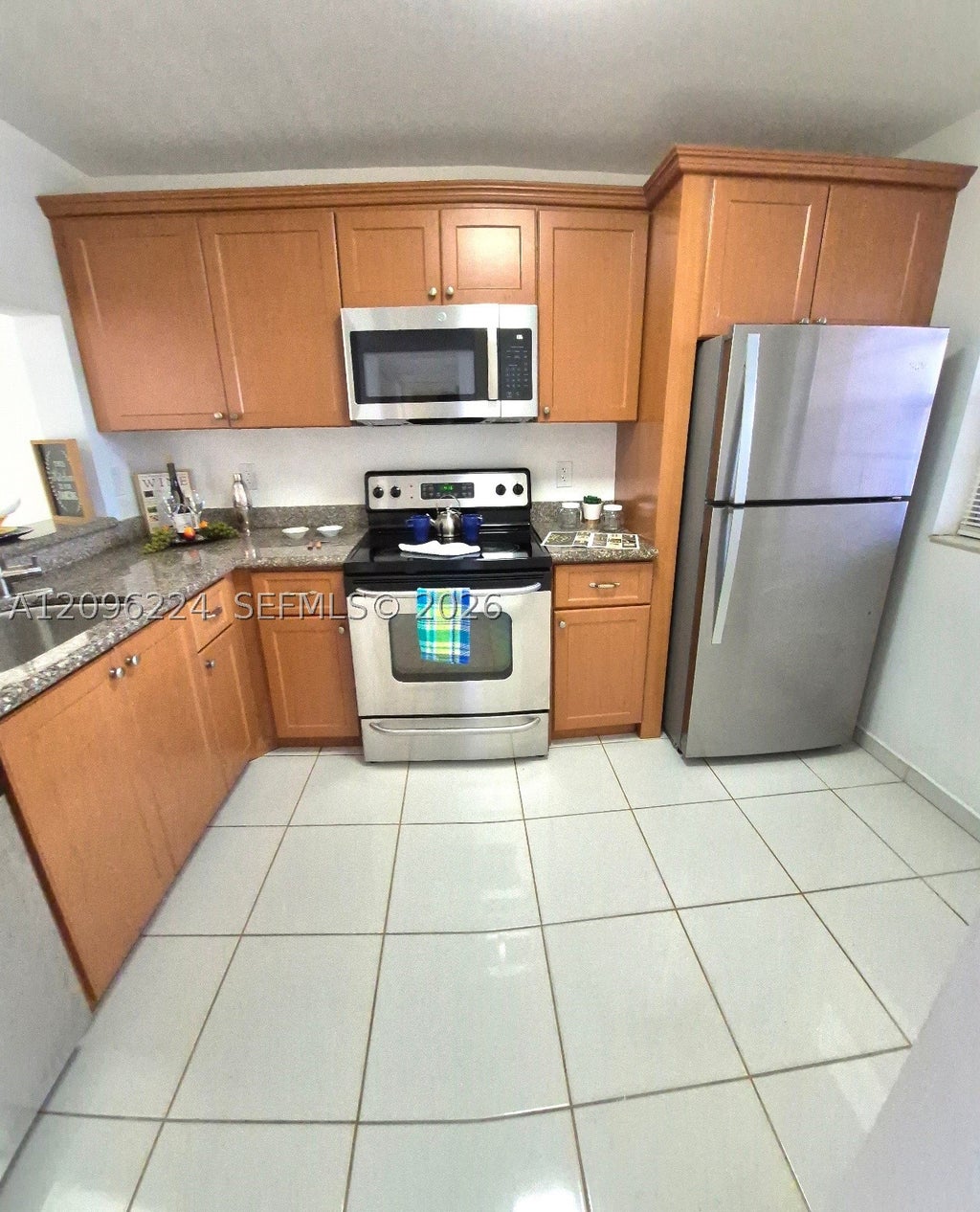 Photo of 1931 Sabal Palm Dr #203, Davie, FL 33324 (MLS # A12096224)