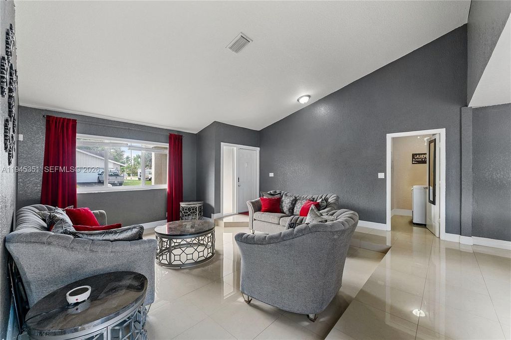 Photo of 7527 SW 6th Ct, North Lauderdale, FL 33068 (MLS # A11945351)