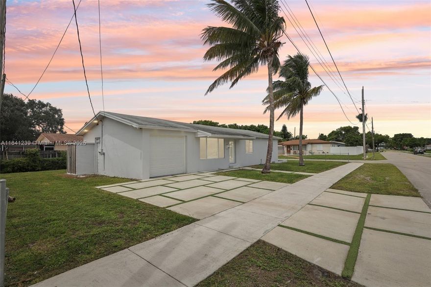 Welcome to this beautifully upgraded 3-bedroom, 2-bath single-family home on a huge corner lot, offering comfort and peace of mind. This home features a 2019 roof, AC, and tankless water heater, plus full impact windows for energy efficiency and storm protection, along with newer appliances. It also includes a TV and security system. The new driveway and inviting curb appeal make a great first impression, while inside you’ll find a spacious layout perfect for family living. Recently inspected, appraised, and lovingly maintained—with all work completed with permits—this home also comes with a transferable termite warranty for added protection. No HOA – move-in ready. Don’t miss this rare opportunity!