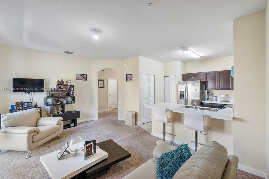 One of the largest models at the Fiji 1,523 sq ft. This town house features 3 bed /2.5 baths very spacious with a lot of space for entertaining downstairs and bedrooms upstairs.Located in  gated family friendly neighborhood with easy access to shopping ,resturants and highways. Residents have access to the Oasis Club for an additional fee,which includes pool,gym,park,walkway pathways with a scenic lakes views.