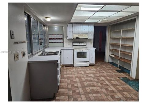 Tiny photo for 750 N Douglas Rd, Pembroke Pines, FL 33024 (MLS # A12006096)