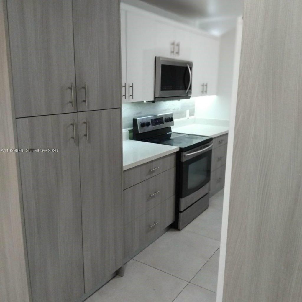 Photo of 1565 NE 48th St, Pompano Beach, FL 33064 (MLS # A11999978)