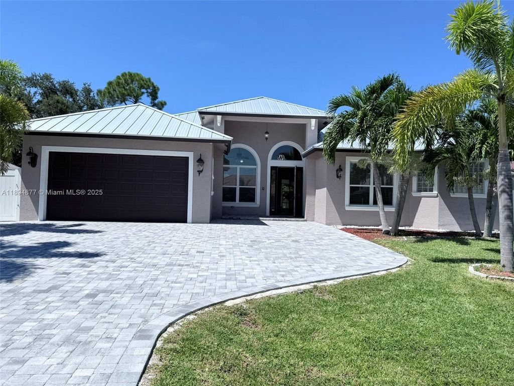 Photo of 1749 SW Desert Ave, Port St Lucie, FL 34953 (MLS # A11894877)