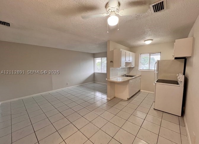 Photo of 2150 Madison St #26, Hollywood, FL 33020 (MLS # A12112891)