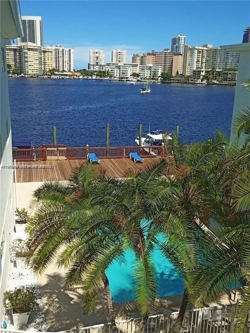 Photo of 462 Golden Isles Dr #202, Hallandale Beach, FL 33009 (MLS # A11983459)