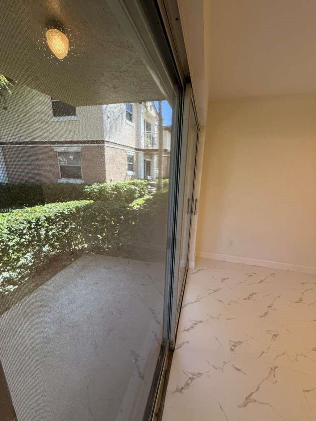 Photo of 11250 SW 13th St #104, Pembroke Pines, FL 33025 (MLS # A11906907)