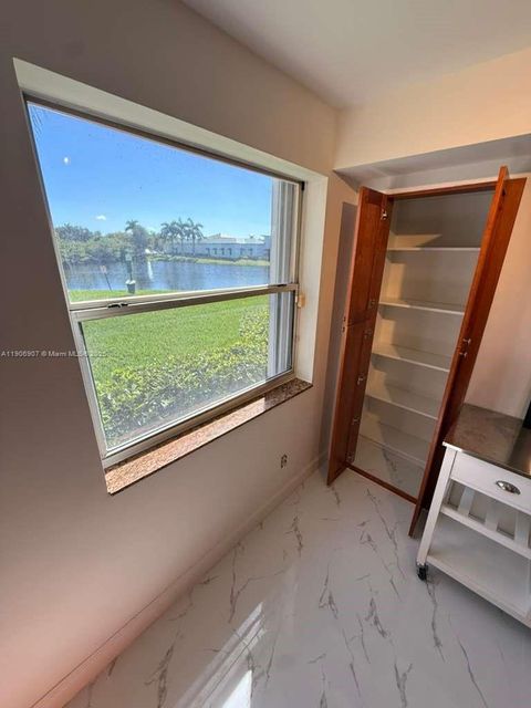 Photo of 11250 SW 13th St #104, Pembroke Pines, FL 33025 (MLS # A11906907)