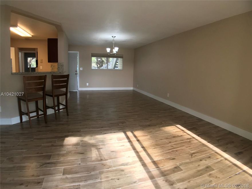 Fully Renovated Lakefront 2BR/2Bath. Beautiful lake view from patio, livingroopm and master bedroom. Split bedrooms, large kitchen with granite countertops, plenty of closets. Full size washer and dryer in the unit. Great 23 acre Lakefront community with resort amenities like Clubhouse, lake front pool, tennis, gym, BBQ and walk/jog trail, vehicle wash area. Great opportunity for investor or owner occupied. Easy to rent. Only 5 minutes to I95 and Turnpike, only 20 minutes to beach.