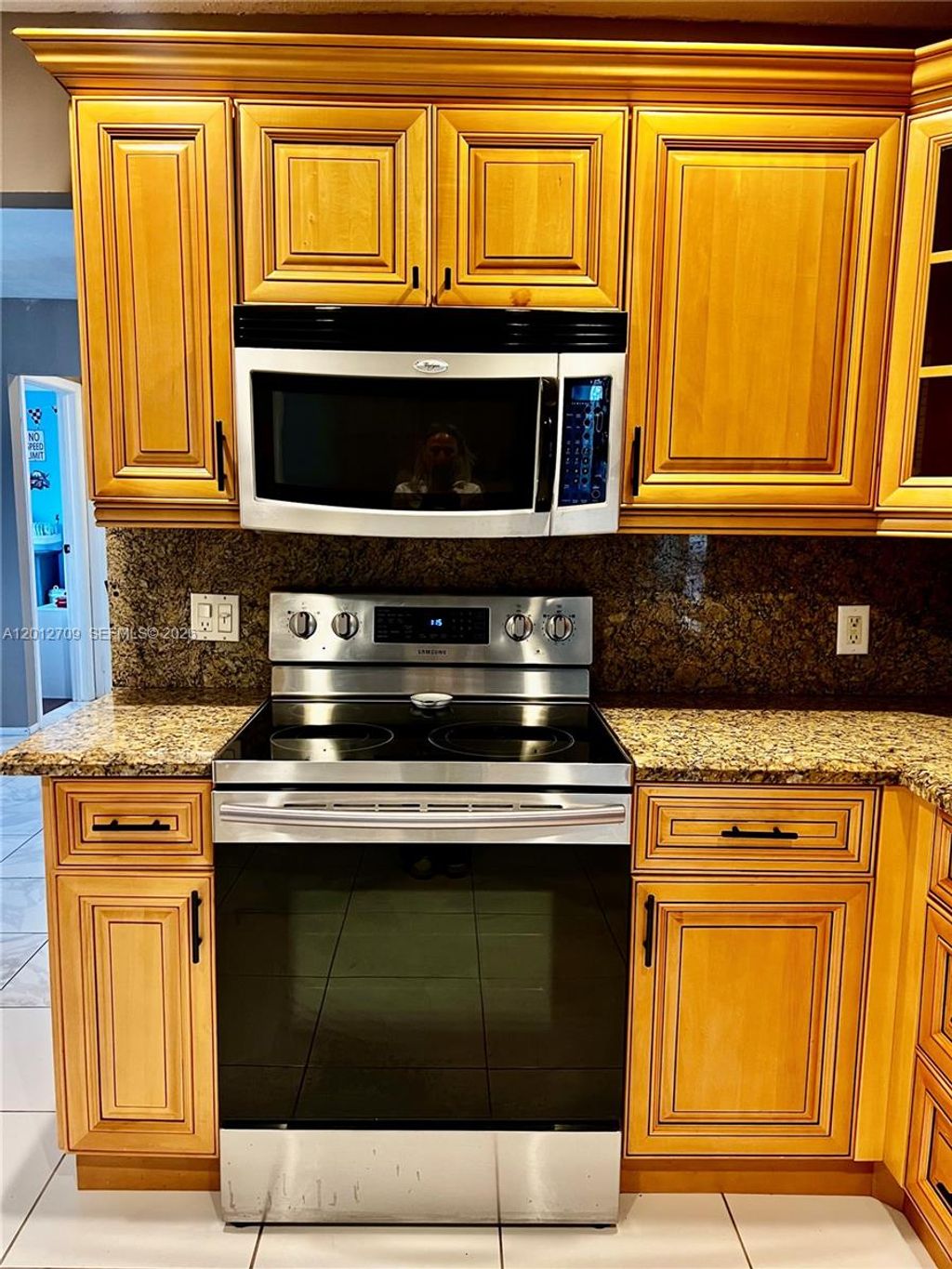 Photo of 8350 NW 27th Pl, Sunrise, FL 33322 (MLS # A12012709)