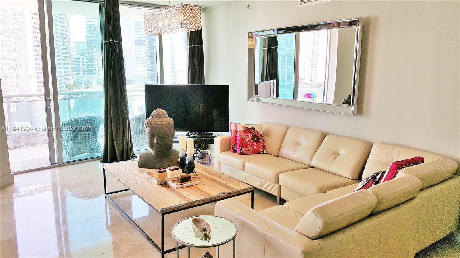 Gorgeous, bright & spacious FULLY FURNISHED 3bed/2bath corner unit at The Wind! Den was converted to a small 3rd bedroom. Best line in the building with amazing water & skyline views! Upgraded travertine floors in living/balcony/bathrooms & hardwood in bedrooms. Huge wraparound terrace, high-end furniture, luxurious lighting fixtures & large walk-in custom master closet. High speed internet & basic cable included. 5-star amenities, racquetball court, movie theater & 2-story event room! 1 minute to i-95, metro-mover, restaurants & next to Brickell City Centre mall. Gated community with great security, mini-market and Mestiza Cafe downstairs. NO PETS. Available August 1st.