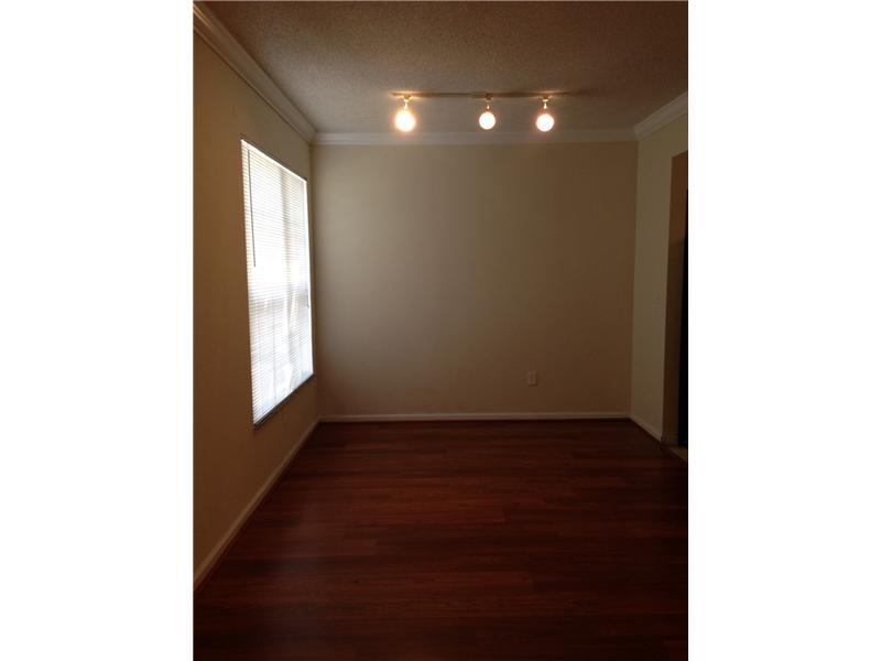 AMAZING CORNER UNIT LOCATED ON THE FIRST FLOOR!!!!! 2 BED/2 BATH AND LAMINATED WOOD FLOORS IN THE ENTIRED UNIT!!! 1 ELECTRIC COVER CAR GARAGE AND LOTS OF SPACE FOR VISITORS!!! FEELS LIKE A HOME!! UPGRADED KITCHEN WITH WOOD CABINETS. NICE FAMILY ORIENTED C OMMUNITY STYLE WITH SWIMING POOL,EXERCISE ROOM, CLUB HOUSE AND MUCH MORE. NEAR 441 AND OTHER MAJOR HIGHWAYS. 600+ CREDIT SCORE A MUST!