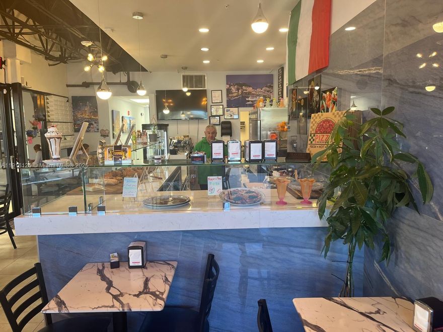 Artisanal Gelato shop in a strategic, high-visibility area of Boca Raton. Offers high-quality artisanal gelato, gourmet sandwiches, fresh salads, and traditional/creative pizzas. Fully equipped and tastefully furnished premises. Loyal customer base with excellent reviews. Strong potential for growth and business development thanks to a diversified menu and constant pedestrian/tourist traffic. Thriving sector with attractive margins, prime location, turnkey operation, ideal for entrepreneurs seeking a solid, well-established business in South Florida.