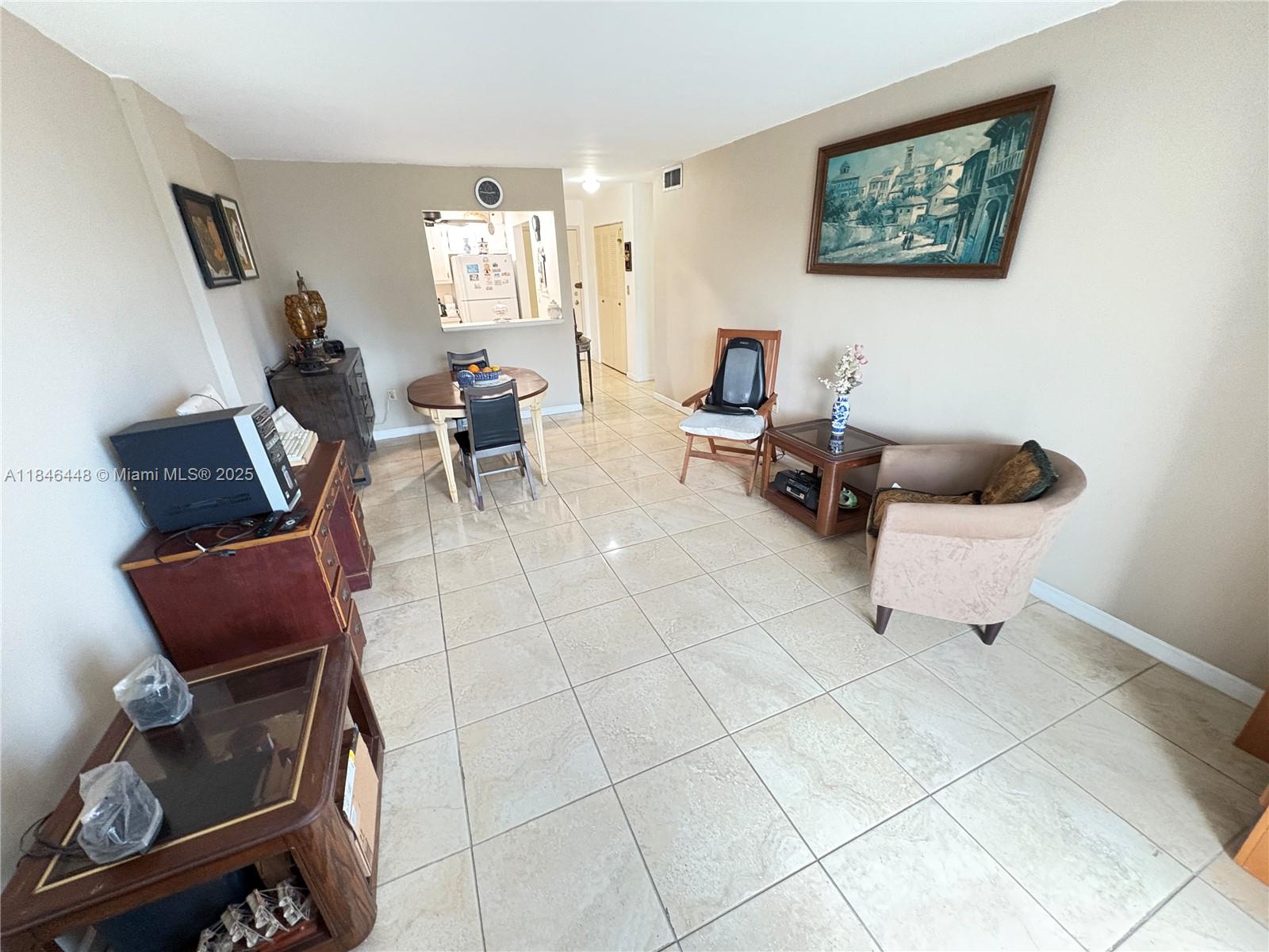 **Best-priced condo in the community** This spacious 1-bedroom, 1-bath unit features tile flooring throughout, impact windows, and impact sliding door. The building has elevator and a laundry facility located on the same floor. Situated in a fully gated community with a pool and clubhouse, the condo allows for immediate rentals. The building is nearing completion of its renovation, which includes brand-new balconies and fresh exterior paint. Located on a quiet street, just minutes from the beach, and short distance to shopping, dining, places of worship, public transportation, and major highways. Directly across from the historic Ancient Spanish Monastery and the North Miami Beach Tennis Center.