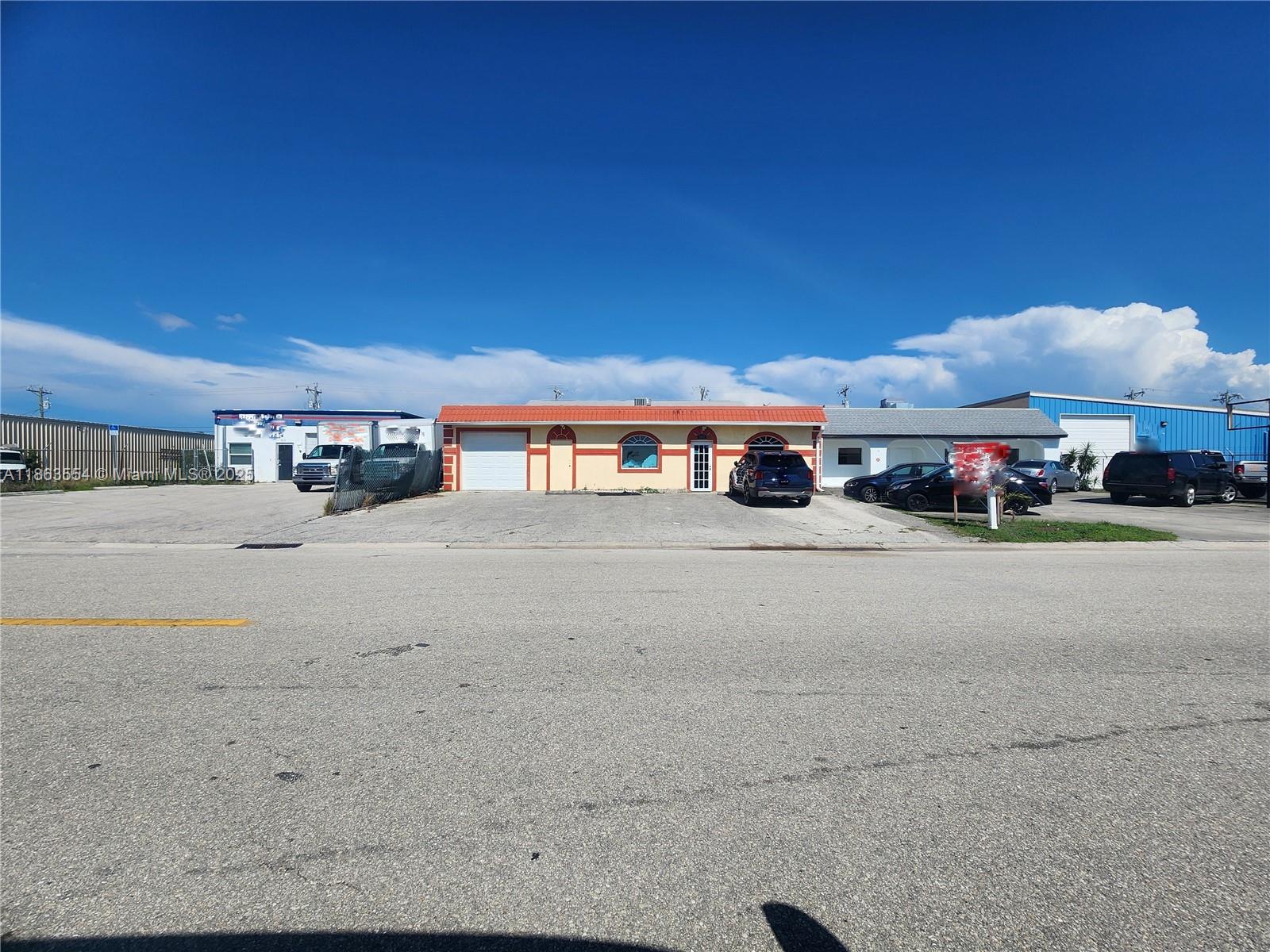 For sale in the desirable Midtown Cape Industrial Park, this 5,700 sq. ft. warehouse offers prime functionality & investment potential. Constructed of concrete block in 1976, the property is equipped with 3-phase electric & a crane system, 3 overhead garage doors (1 front-facing and 2 rear/alley access), providing convenient loading and unloading options. Inside, the layout includes 3 private offices, 3 bathrooms, & open reception area. Zoned I-1 Warehouse, this property offers flexible usage opportunities. The roof consists of a combination of shingle & flat construction, & the property sits in Flood Zone X (minimal flood risk). Ample space and infrastructure make this an excellent option for businesses seeking a central Cape Coral location. Property is being sold As-Is.