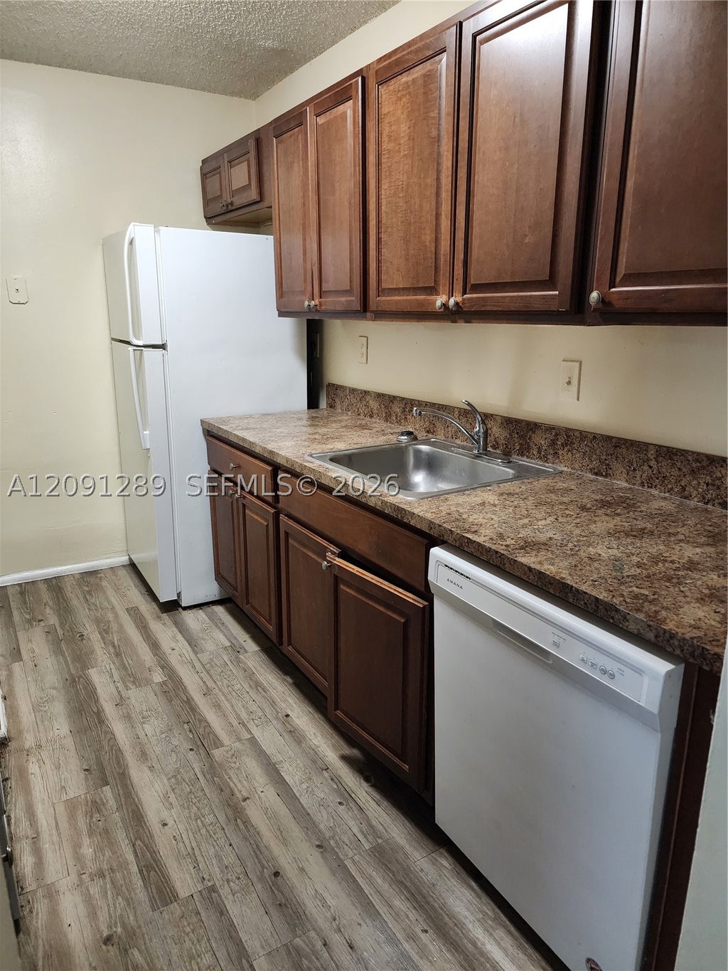 Photo of 1201 Lake Victoria Dr #E, West Palm Beach, FL 33411 (MLS # A12091289)
