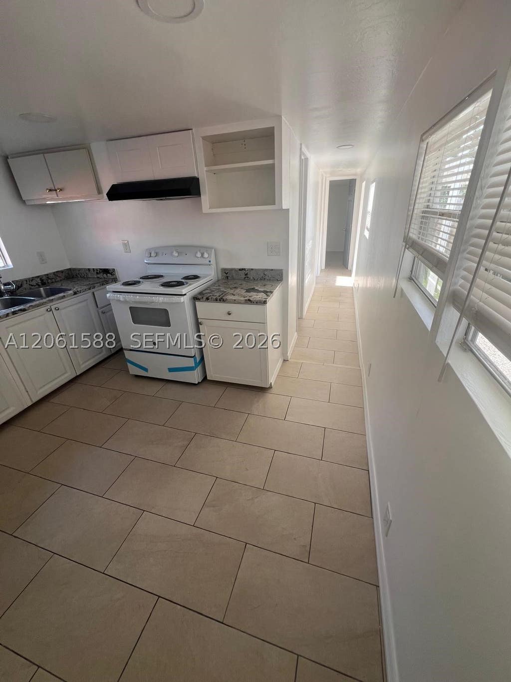 Photo of 13331 SW 8th St #13331, Davie, FL 33325 (MLS # A12061588)
