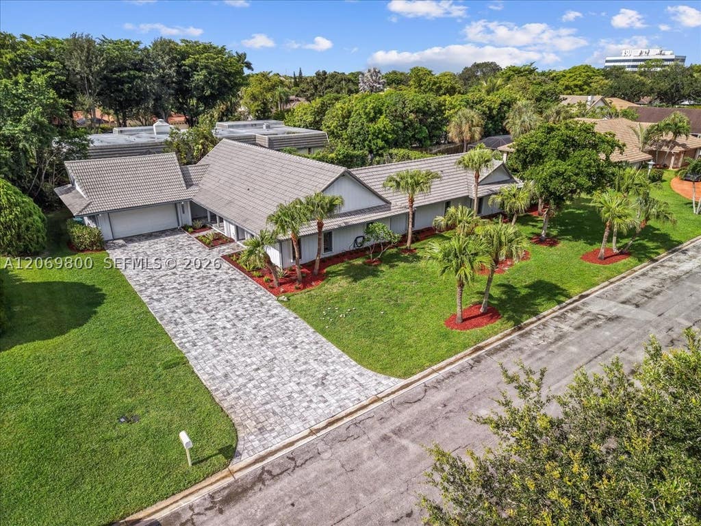 Photo of 9220 NW 15th St, Coral Springs, FL 33071 (MLS # A12069800)