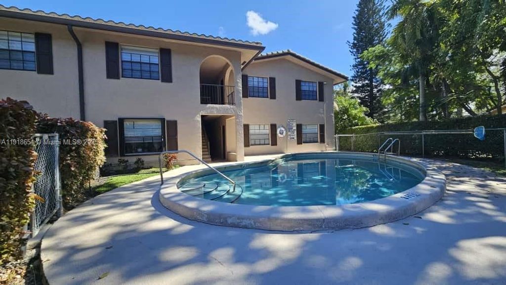Photo of 3307 NW 108th Dr #8B, Coral Springs, FL 33065 (MLS # A11918654)