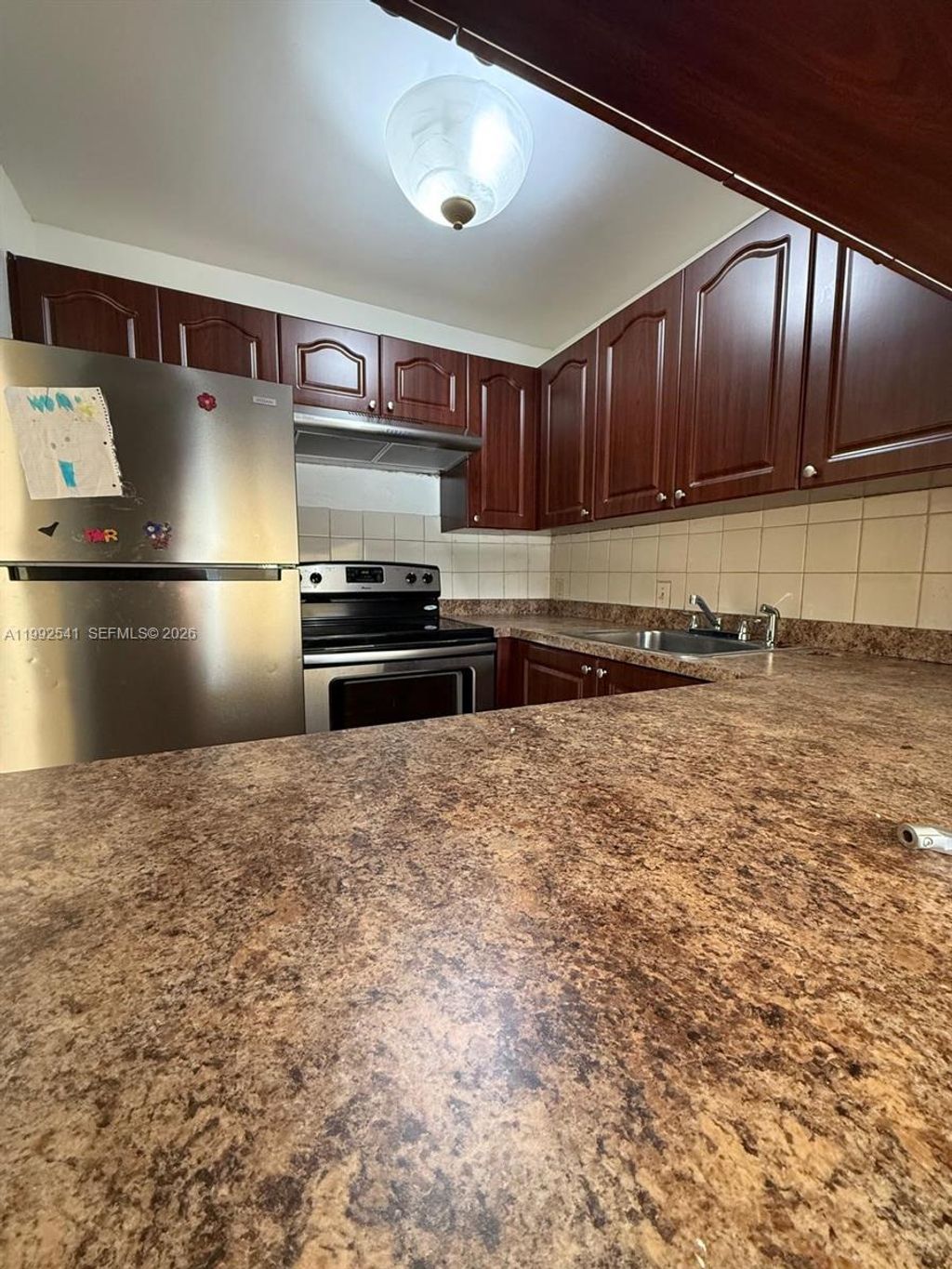 Photo of 4848 NW 24th Ct #309, Lauderdale Lakes, FL 33313 (MLS # A11992541)