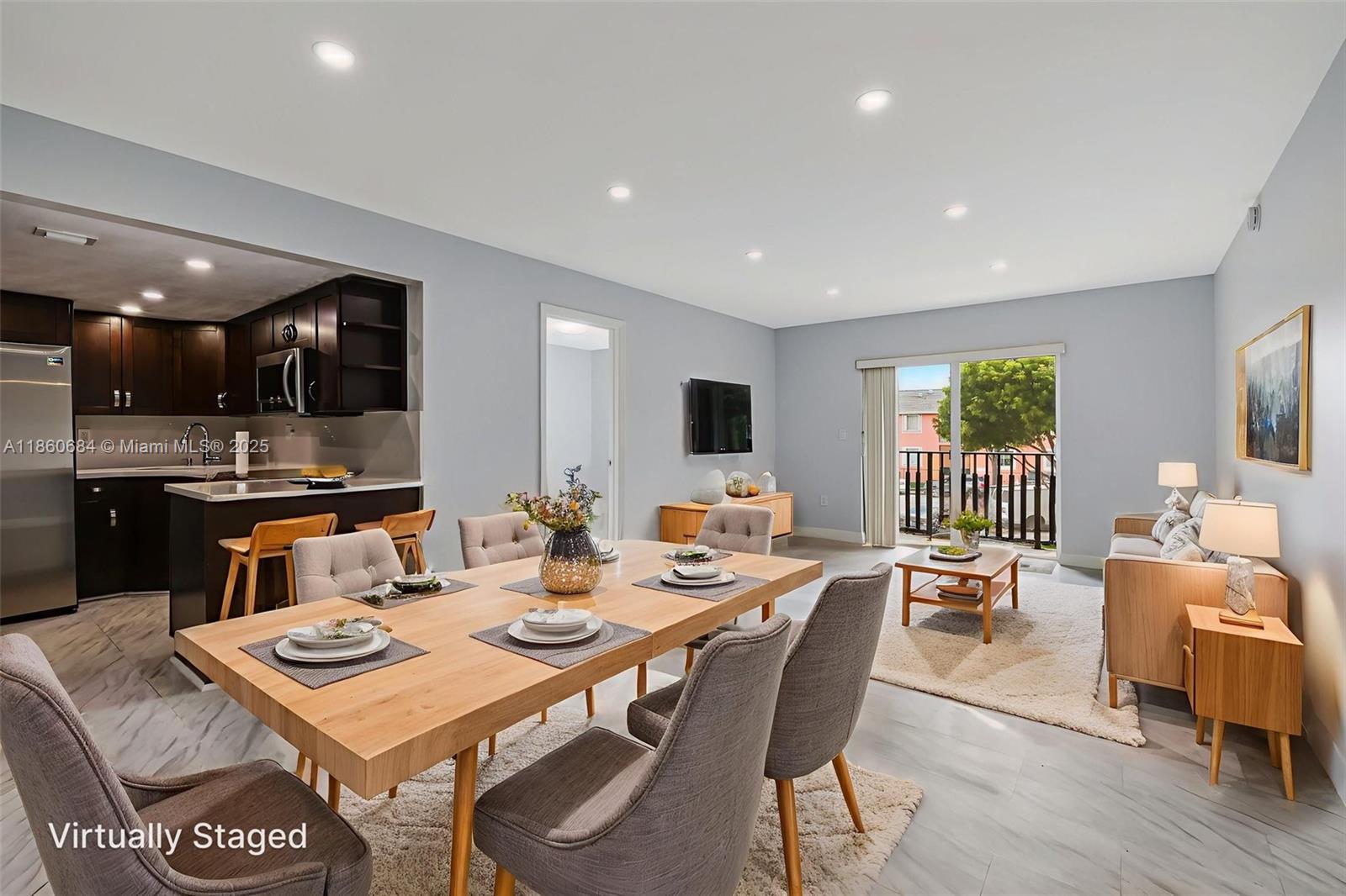 Welcome to this beautifully renovated 3 bedroom, 2 bath, split-floor plan unit at the guard gated Sunset Villas. The unit has been freshly painted and includes hurricane impact windows and sliding door. The open floor plan is perfect for family gatherings and entertaining. The kitchen is equipped with stainless steel appliances, quartz counter top, and plenty of cabinet space. Great opportunity as a primary residence or as an investment, as first year rentals are allowed. Located in Blue Lagoon, perfect for water sports enthusiasts. Less than 5 minutes from Miami International Airport, major highways, dining, entertaining & public transportation. Amenities include swimming pool and play area. Pet friendly building and exterior cameras.