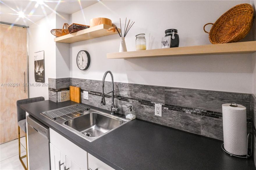 A MUST SEE!!! STUNNING UPDATED UNIT WITH AMAZING CITY VIEWS FROM THIS BEAUTIFUL SPACIOUS 1 BEDROOM 1.5 BATHROOM UNIT LOCATED IN THE COMMUNITY OF HILLCREST IN THE HEART OF HOLLYWOOD. GREAT LOCATION ON THE 8TH FLOOR. RELAX OVERLOOKING THE TRANQUIL CITY VIEWS. PROPERTY FEATURES BEAUTIFUL FLOORING THROUGHOUT, UPDATED KITCHEN AND BATHS. **BRAND NEW REFRIGERATOR (2025)**. **BRAND NEW A/C UNIT (2026)** AND **BRAND NEW WATER HEATER (2026)**. UNIT IS BEING SOLD FURNISHED. THIS COMMUNITY IS AN ACTIVE ADULT COMMUNITY, 24/7 SECURITY & OFFERS MANY ACTIVITIES. AMENITIES INCLUDE: POOL, CLUBHOUSE, COMMON LAUNDRY, ON SITE MANAGEMENT OFFICE, WALKING TRAILS, & SO MUCH MORE. LOW ASSOCIATION FEE. CONVENIENTLY LOCATED NEAR EXPRESSWAYS, RESTAURANTS, SHOPPING, BEACHES, ETC. ALL CLOSE BY. THIS UNIT IS GREAT FOR ALL YEAR LIVING OR 2ND HOME. TRULY A MUST SEE! THIS UNIT IS MOVE-IN READY!!