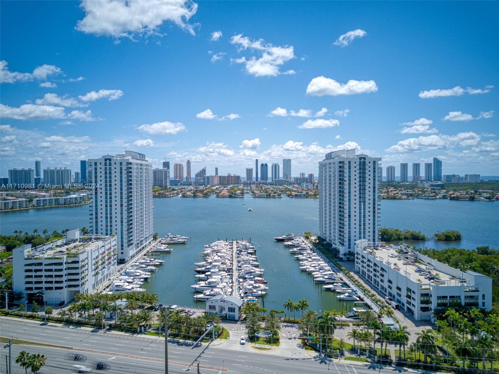 Marina Palms best line available (line 09), this is a 3 beds plus 3.5 baths corner unit with the best South-East Views overlooking the Marina, bay and ocean. It features: Snaidero kitchen, High-end appliances, Italian Porcelain tiles through-out with built-0ut closets. The building is one of the best around; it has Tons of amenities including: heated over-sized pool, A full-service marina with: boat, jet ski, paddle board, kayak and canoe rentals, *there are boat slips for sale*, in-house Butler service, state of the art gym/spa with yoga & spinning classes, conference, game and coffee rooms, indoor and outdoor kids entertainment areas, and a teenage game room. *2 deeded parking spaces and a large storage with this unit (developer floorplan has 2421 sq ft interiour + 203 of balcony)