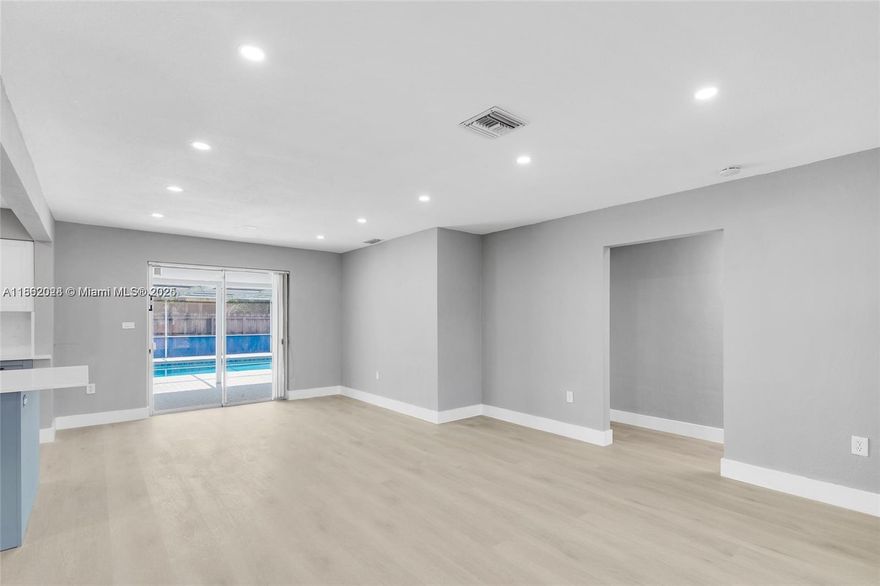 Experience the charm of this stunning corner 3 bed, 2 bath home, complete with a convenient carport and spacious circular driveway. Revel in the elegance of new floors and a recently renovated kitchen, equipped with brand NEW appliances. Step outside to your screened pool and enjoy alfresco dining with a unique OUTDOOR STONE OVEN perfect for pizza and other dishes. Ample storage is available in the dedicated STORAGE room. The expansive outdoor space offers endless possibilities for relaxation and entertainment. Perfect for families and entertainers alike, this home combines comfort, style, and functionality. Don't miss this exceptional property close to multiple shopping centers, eateries, 441, Turnpike, i95 and Houses of Worship.