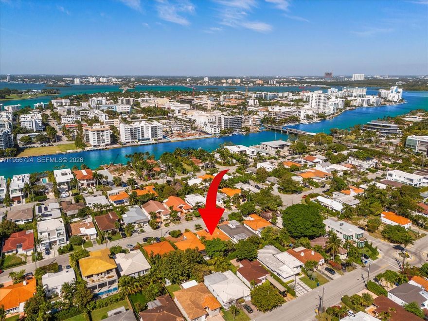 Newer tile roof, new A/C,  & gas water heater provide peace of mind and strong structural value. Located on one of the best blocks in the oceanfront Town of Surfside, just steps to the beach, this updated family home blends modern comfort with classic charm. Features 3 bedrooms, 3 baths, and a  den, and a 1-car garage with easy 5-bedroom potential by enclosing the den and converting the garage. Highlights include updated electrical, recessed lighting, hardwood floors, custom cedar-lined closets, updated appliances (2020), and hurricane shutters. Soaring ceilings and elegant molding enhance timeless style. Kitchen with granite countertops and stainless steel appliances. Enjoy community beach club & pool, tennis, pickleball, playgrounds, Bal Harbour Shops, Four Seasons Surf Club, shopping, houses of worship, A-rated Bay Harbor schools. Rare Surfside opportunity steps to the beach  & town center.